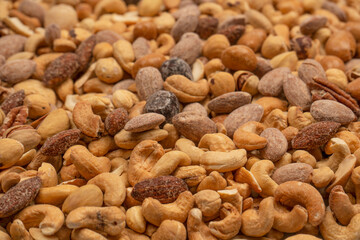A group of almonds, pistachios, walnuts, macadamia, cashews.