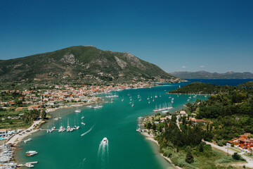 Popular Tourist destination. Bay with boats on Lefkada island. Nydri village.