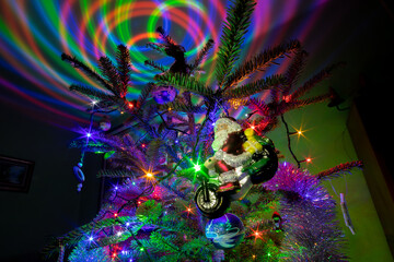 Christmas tree with a lot of lights - obrazy, fototapety, plakaty