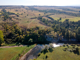 Fototapeta na wymiar Aerial view of Vit river, passing near village of Aglen, Bulgaria