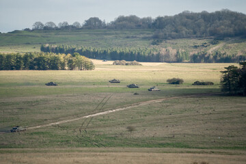 Fototapeta na wymiar a squadron of British army FV4034 Challenger ii 2 battle tanks on a military combat exercise, Wiltshire UK