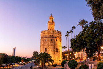 Golden tower, Torre del Oro, at sunset in Seville, Andalusia. Spain.