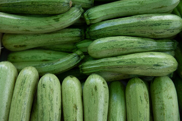 Green zucchini to sale on street market stall in Sao Paulo city, Brazil