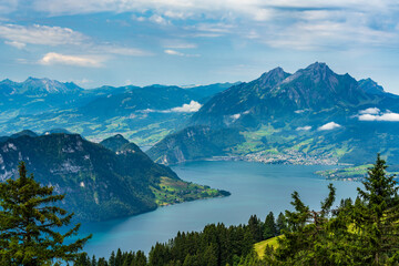 Fototapeta na wymiar Switzerland 2022, Beautiful view of the Alps from Rigi Kulm. Lake Luzern and Pilatus.