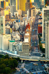 Aerial view of the cityscape and streets at sunset in Minato, Tokyo, Japan