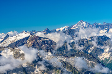 Obraz premium Switzerland 2022, Beautiful view of the Alps and Blue Sky around Titlis mountain.