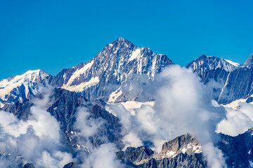 Fototapeta na wymiar Switzerland 2022, Beautiful view of the Alps and Blue Sky around Titlis mountain.