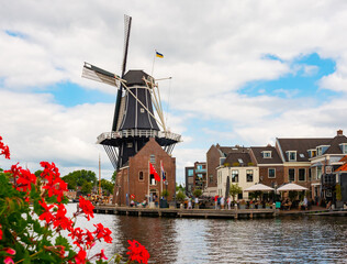 Fototapeta na wymiar Famous Windmill De Adriaan in Haarlem, capital of province of North Holland, Netherlands