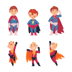 Funny little boys in superhero costumes set. Happy cute boys in capes in different poses cartoon vector illustration