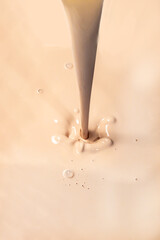 Beige Cosmetic Cream splash Isolated on White Background.