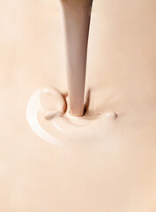 Beige Cosmetic Cream splash Isolated on White Background.