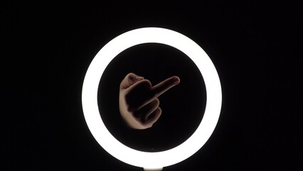 gesture package. female hands close-up make figures from fingers. finger play. Middle finger up. Obscene gesture fuck yourself