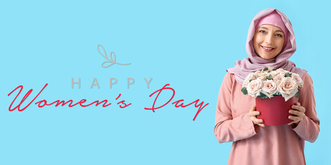 Beautiful mature Muslim woman with flowers on blue background. International Women's Day celebration