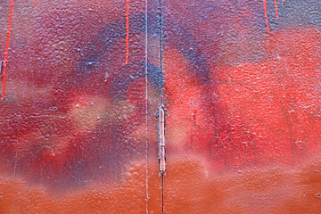 mancha de color tonos rojos morados ocres puerta metálica 4M0A7180-as23