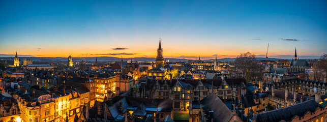 Oxford city aerial rooftop skyline at sunset. England