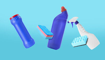 Flying bottles of detergents and cleaning sponges on blue background