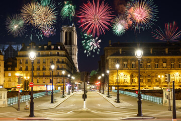 Fototapeta na wymiar Notre Dame cathedral with New Year fireworks in Paris. France