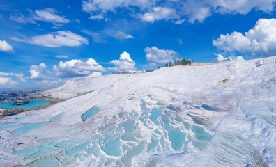 Natural travertine pools Pamukkale Turkey, terraces with blue water, aerial top view