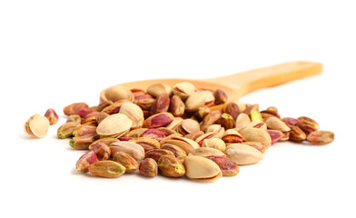 Heap of tasty pistachio nuts and wooden spoon isolated on white background
