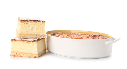 Baking form with cake and pieces of delicious cheese pie isolated on white background