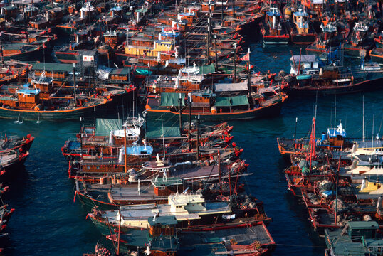 Boats stacked together in typhoon harbor in Hong Kong.