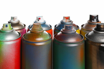 Used cans of spray paints on white background