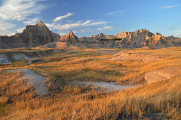 Sunset in the rock formations and grasslands of Badlands NP