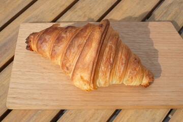 croissant on the wooden board