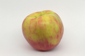closeup single apple white background