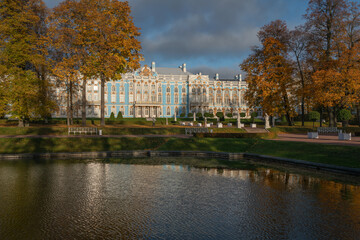 View of the Catherine Palace with a reflection in the Mirror Pond of the Catherine Park in Tsarskoye Selo on a sunny autumn day, Pushkin, Saint Petersburg, Russia
