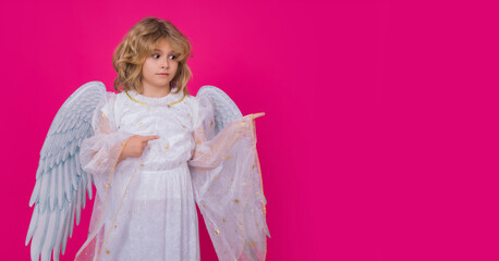 Child angel pointing finger, point gesture. Valentine's day. Banner for website header design.