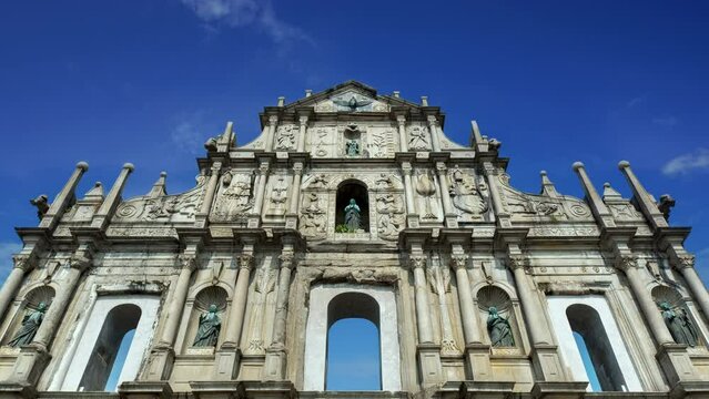 Ruin of St.Paul cathedral time lapse on a sunny day, the travel destination landmark of Macau, China.