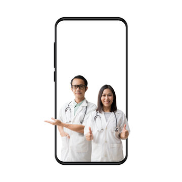 Medical Services. Asian Doctor Woman And Man, Hand Holding Something And Thump Up In Big Smartphone, Isolated Background