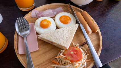 Bread, Fried Egg, Sausage and Ham Breakfast made like a human face