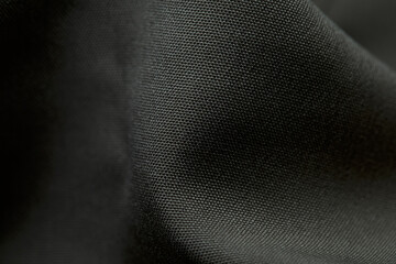 Grey fabric background. Grey cloth waves background texture. Grey fabric cloth textile material.