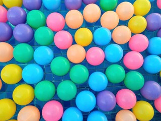 Close Up View of Assorted Color Plastic Balls, on the Pool