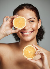 Woman, smile and orange in studio for skincare, health and wellness with cosmetic glow, self care...
