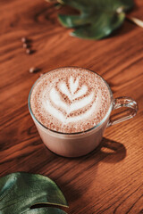 Cup of hot chocolate on wooden table