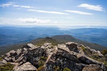 Fototapeta na wymiar hiking up to the summit of a rocky mountain in australia