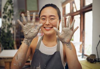 Pottery, happy and hands of a portrait woman at a messy workshop for art, design and work. Small...