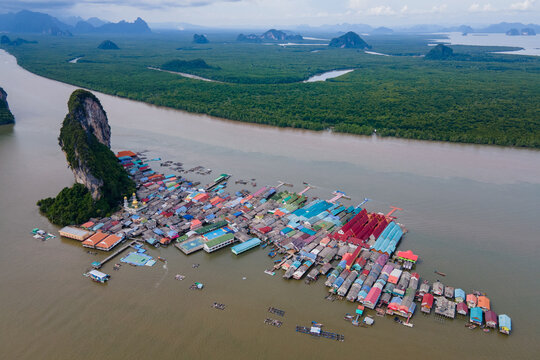 Aerial view over the floating fishing village at Ko Panyi (or Koh Panyee) one of famous travel destination in Phang Nga Bay, Phang Nga province, Thailand.