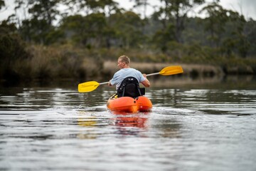 Kayaking on the river at sunset in Australia