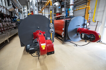 Gas burner on boiler for steam production.