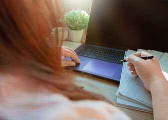 proofreading paper on table in office