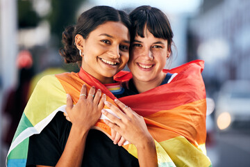 Women, lgbtq and portrait with pride flag for love, equality and support in city. Gay, lesbian and...