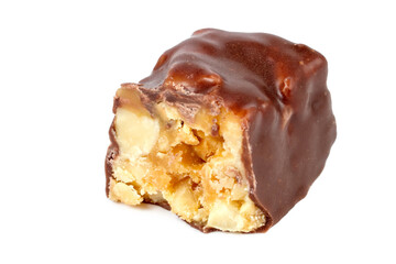 Half a chocolate candy with nuts on a white background.