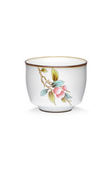 Detailed shot of a white original porcelain color printed cup in chinese style. The designer bowl with an image of a fruit branch is isolated on the white background.