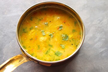 Healthy nutritious Indian comfort food Dal Chawal. Popular food yellow Dal Tadka or lentil curry. Protein rich superfood. copy space.