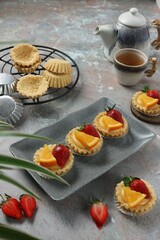 mini pies with cream and fruit filling