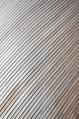 grey wooden background with rounded curved line boards planks